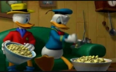 Review Donald Duck: Quack Attack: Donald en Guus kijken naar Katrien.
